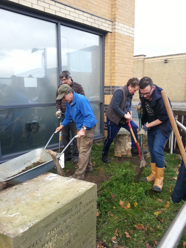 Volunteers from Goole Civic Society prepare ground for siting historic school stone