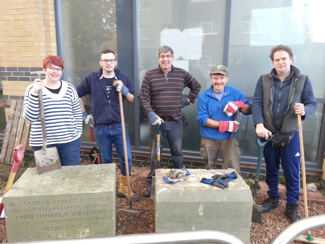 Volunteers from Goole Civic Society take a break after resiting historic school stone