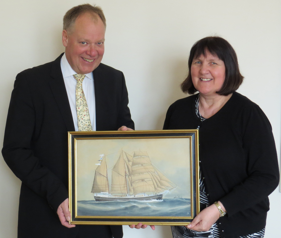 Humber Bondholders chairman and shipbroker Peter Aarosin gives his Reuben Chappell watercolour to Goole Civic Society Chair Margaret Hicks-Clarke